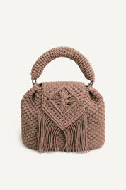 Front view of the woven brown Assos crochet top-handle bag with fringe detailing