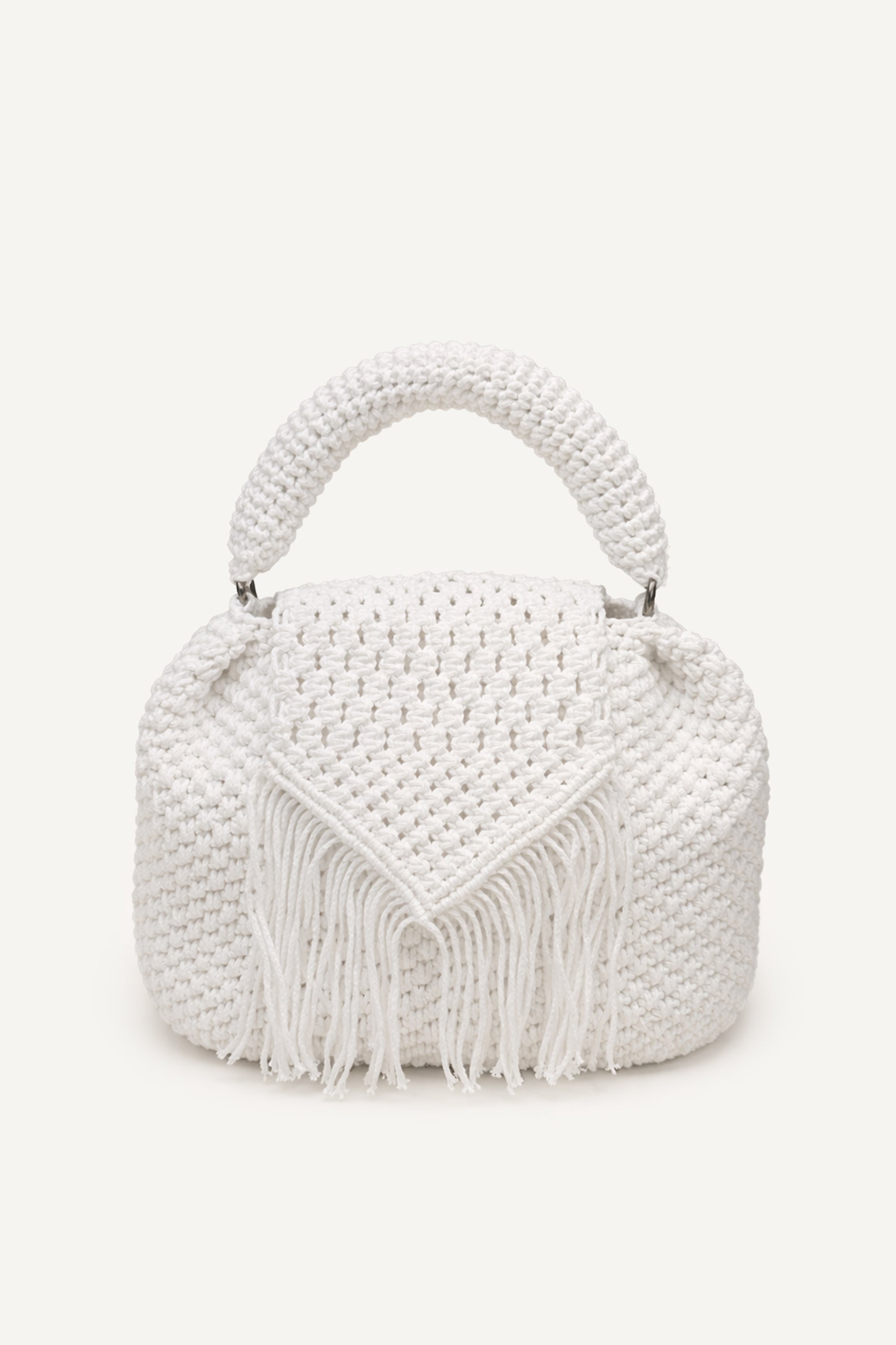 Front view of the white assos crochet top-handle bag with fringe detailing