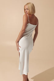 Back view of Amara Midi Dress in milk with minimalist silhouette and flattering fit