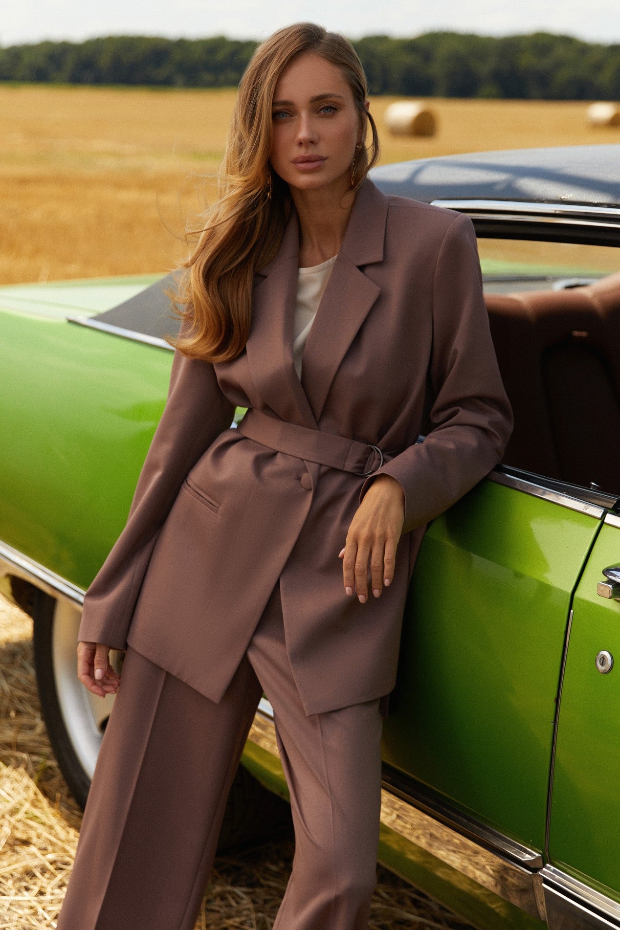Front view of Continental Blazer by FemeAdor in brown featuring a belted tailored silhouette, ideal for professional and casual styling