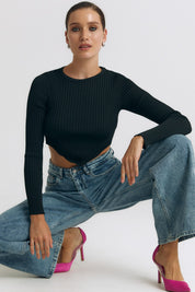 Another front view of the Cropped Longsleeve by FemeAdor in black featuring a flattering cropped cut and a cozy fitted ribbed knit design