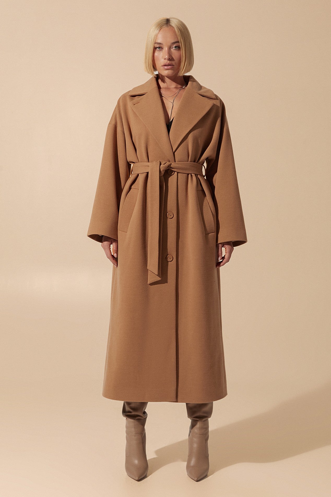 Front view of Elysian Overcoat by FemeAdor in brown with wide lapels and a tailored silhouette, ideal for fall and winter styling