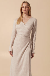 Close up view of the Emberlyn Midi Dress in beige angora fabric with longsleeves and wrap around belt