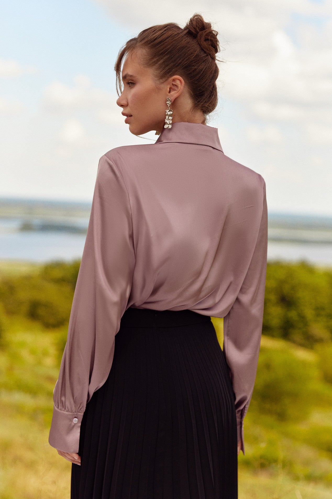 Back view of Eminence Blouse by FemeAdor in pink featuring a flattering fit and luxurious fabric, ideal for professional and casual styling
