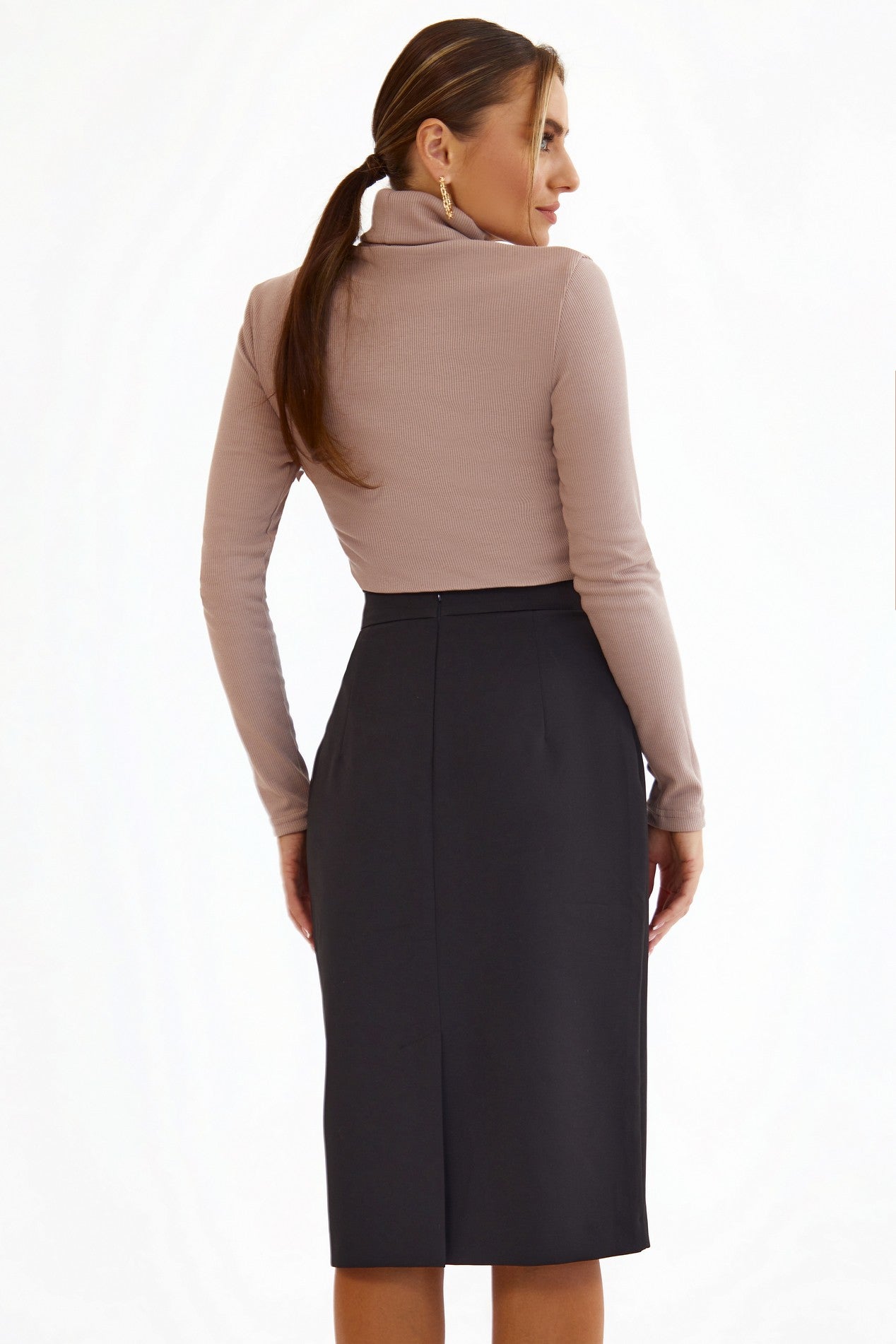 Back view of Liaison Skirt by FemeAdor in black featuring a sleek, figure-flattering midi silhouette, ideal for both professional and casual styling