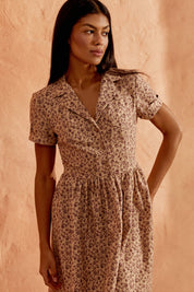 Close up view of the Mocha Mini Dress in brown floral linen with short sleeves by FemeAdor
