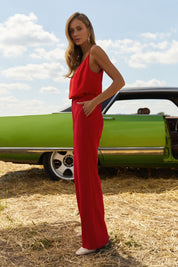 Side view of Moda Trousers by FemeAdor in red featuring a high-waisted, wide-leg tailored fit for modern styling