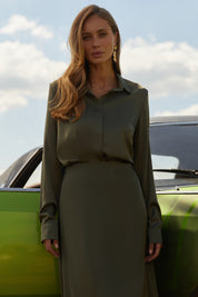 Front view of Nora Blouse in green satin with silk-like sheen and flattering drape, perfect for work or special occasions