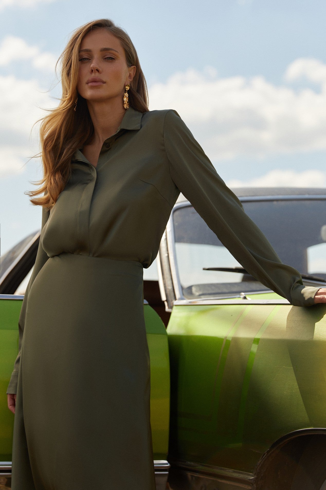 Another front view of Nora Blouse in green satin with silk-like sheen and flattering drape, perfect for work or special occasions