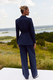 Back view of Regal Trousers by FemeAdor in navy blue with high-waisted, wide-leg tailored fit, perfect for professional and casual styling