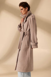 Side view of Royale Overcoat by FemeAdor in beige featuring wide lapels and a tailored silhouette, ideal for both professional and casual styling