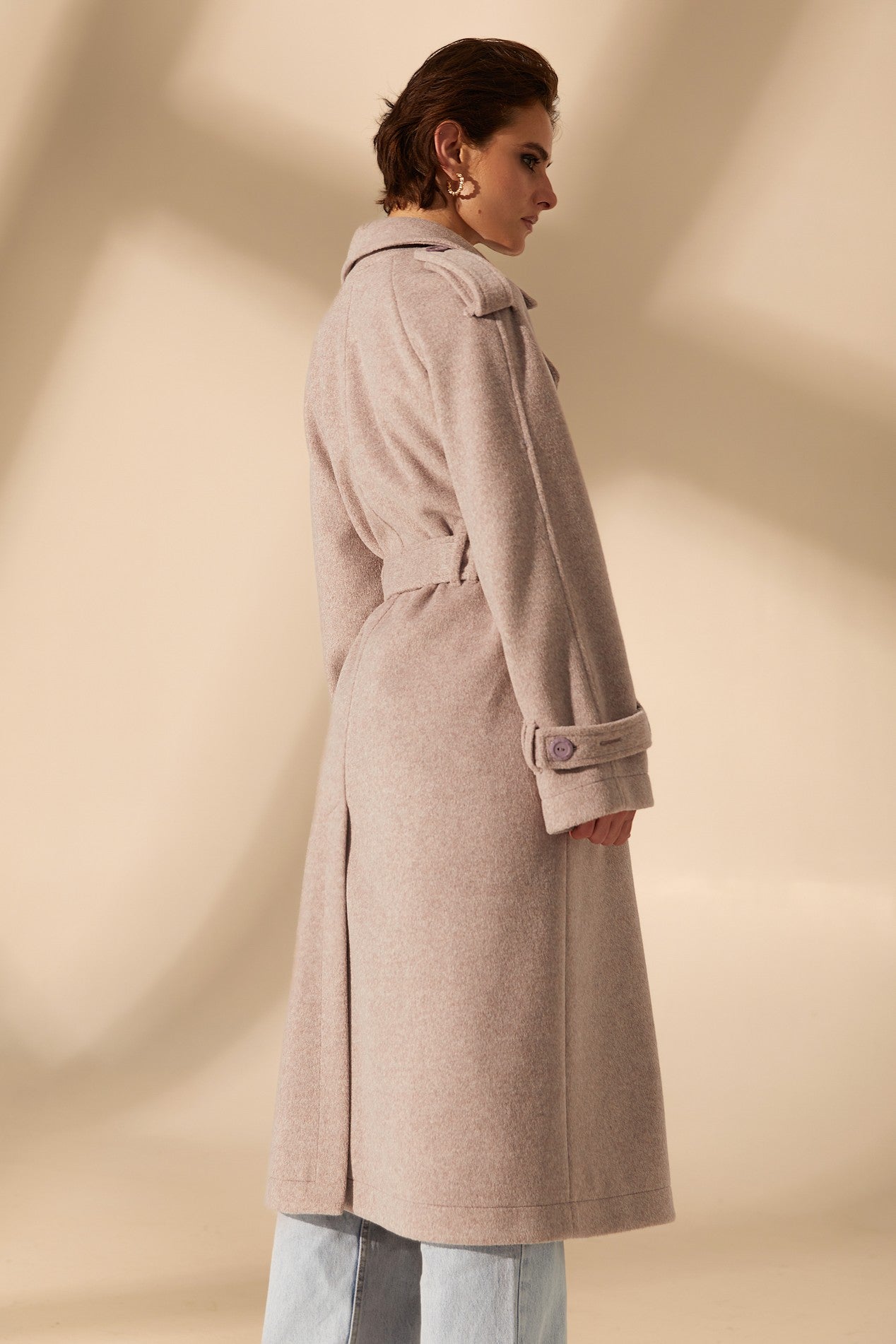 Back view of Royale Overcoat by FemeAdor in beige featuring wide lapels and a tailored silhouette, ideal for both professional and casual styling