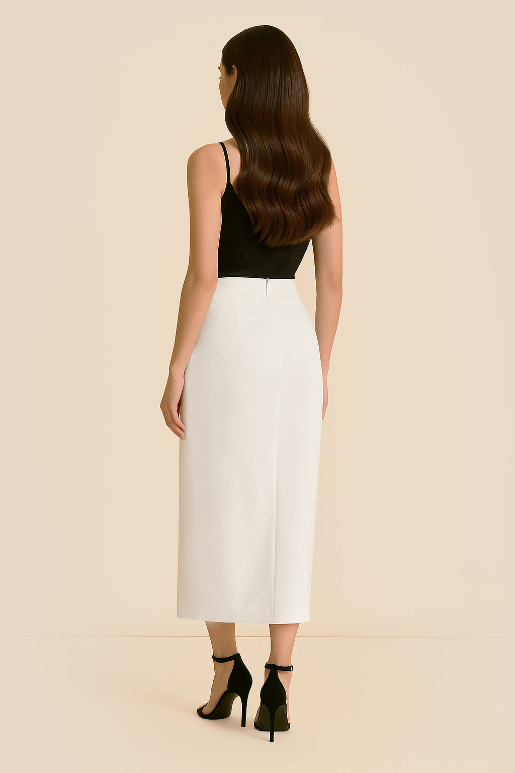 Back view of Ardor Skirt by FemeAdor in white featuring a high-waisted, midi-length silhouette with delicate tailoring, ideal for both professional and casual styling