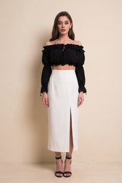 Front view of Ardor Skirt by FemeAdor in white featuring a high-waisted, midi-length silhouette with delicate tailoring, ideal for both professional and casual styling