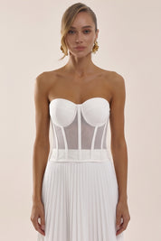 Front view of a woman wearing the white Timeless Corset by Femeador with a structured fit, lace-up back and romantic silhouette