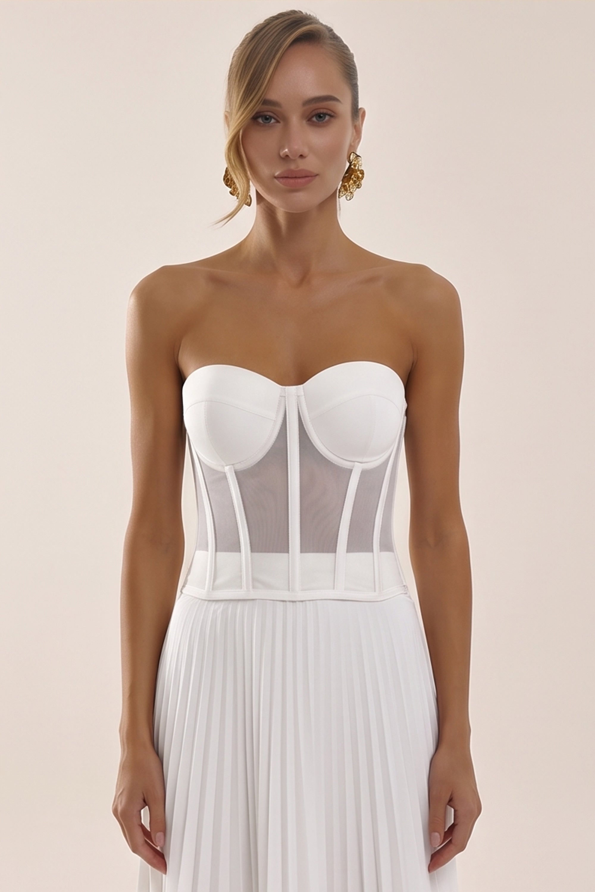 Front view of a woman wearing the white Timeless Corset by Femeador with a structured fit, lace-up back and romantic silhouette